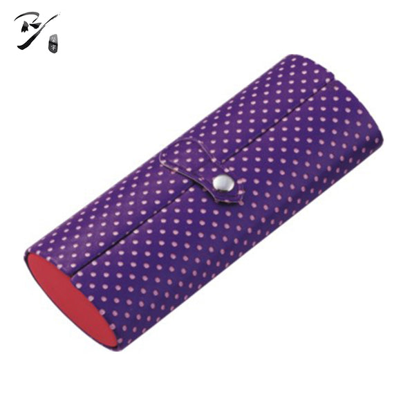 Oval blue spectacle case with white dots