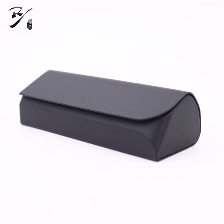 Rectangular handmade eyewear case with an arched top flap and slightly rounded corners