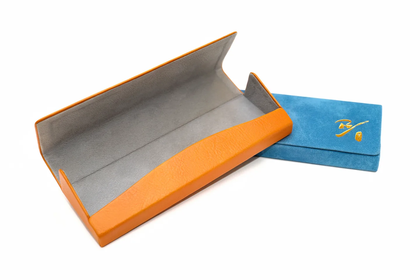 Handmade glasses cases with orange and blue finishes